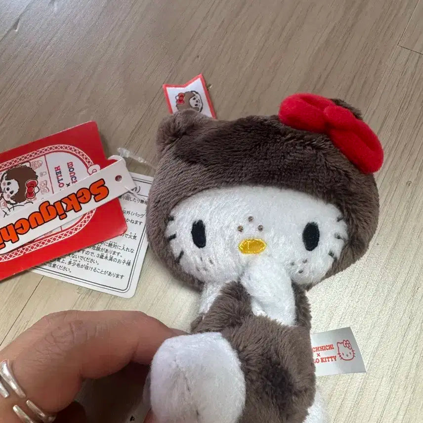 세키구치 칫치 헬로키티 콜라보 인형 몬치치