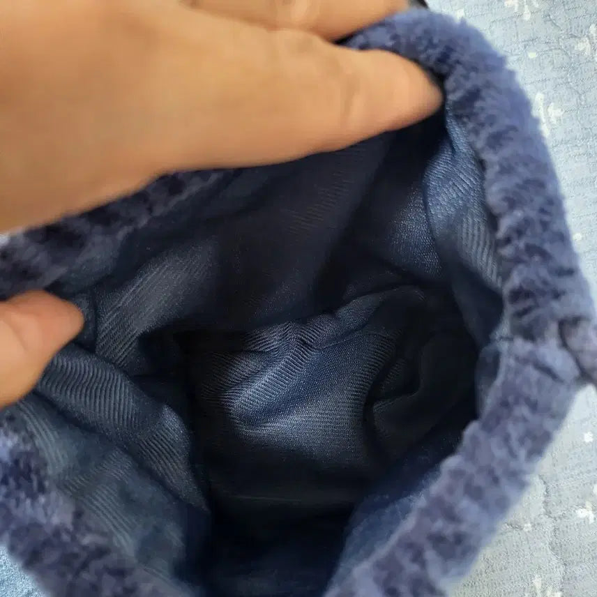라이즈 토냥덕 파우치