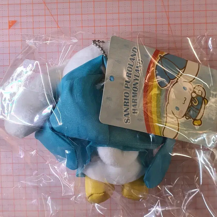 [BUNJANG] Sanrio Cinnamoroll Puroland Raincoat Plush Keychain / 산리오 시나모롤 퓨로랜드 우비 인형 키링