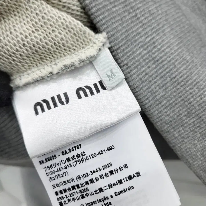 [BUNJANG] Miu Miu Half Zip Crop Sweatshirt MJL070 (M) / 미우미우 하프 지퍼 크롭 스웨트셔츠 MJL070 M 새상품