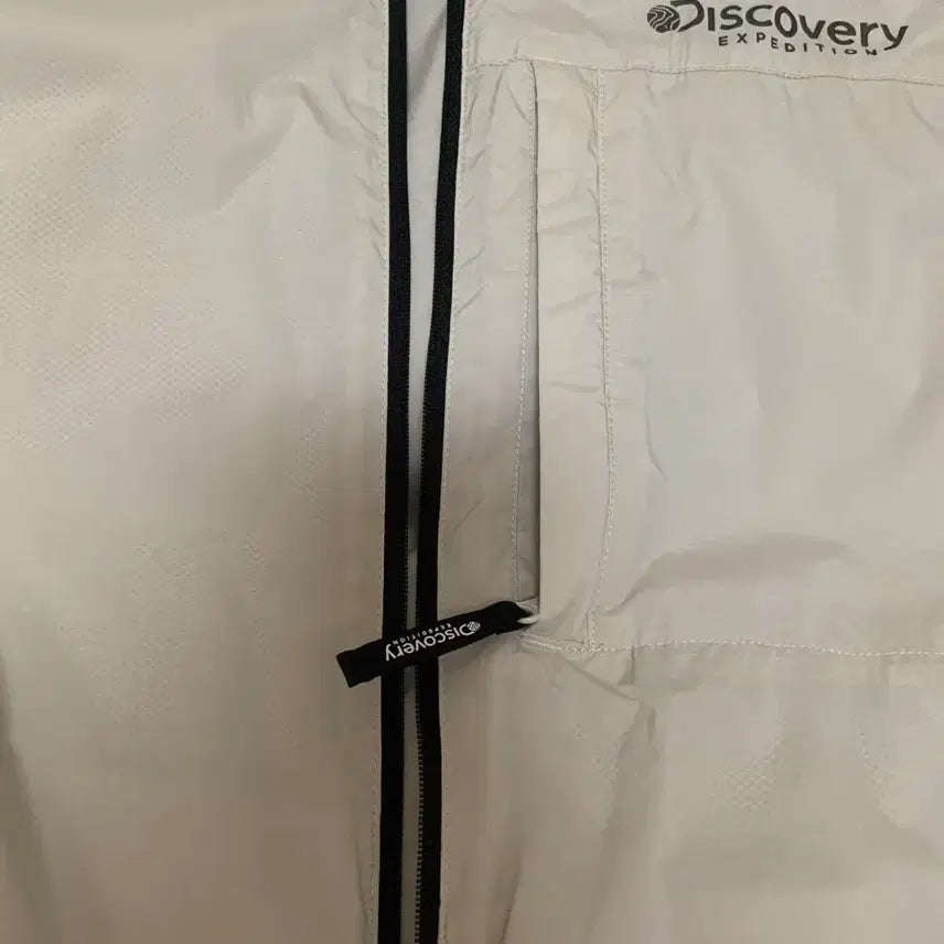 [BUNJANG] Discovery Ivory Windbreaker Jacket / L 디스커버리 바람막이 아이보리 봄 자켓