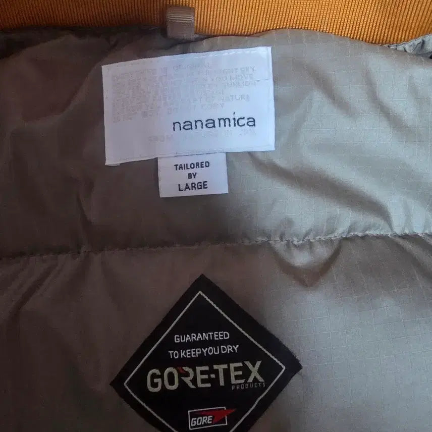 [BUNJANG] Nanami Kowa Gore-Tex Short Down Sunset / 나나미카 고어택스 숏다운 선셋