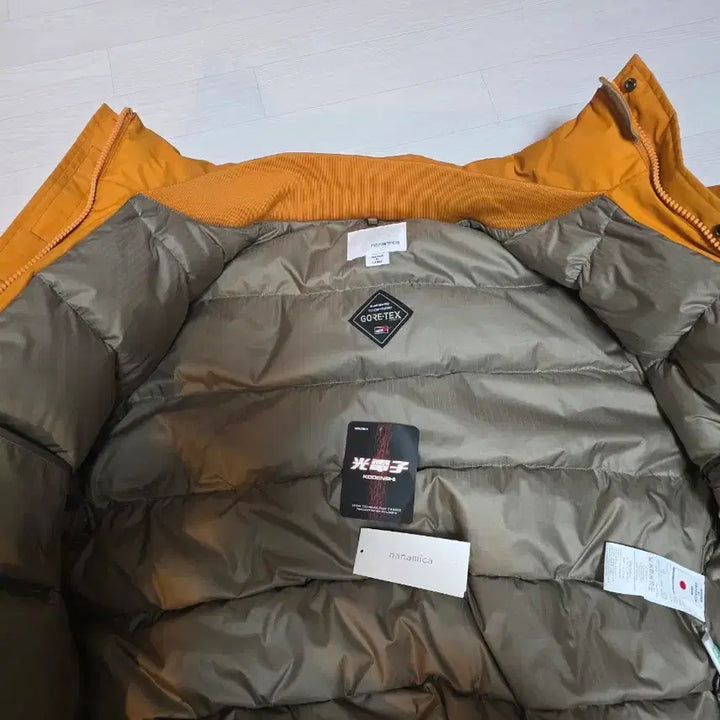 [BUNJANG] Nanami Kowa Gore-Tex Short Down Sunset / 나나미카 고어택스 숏다운 선셋