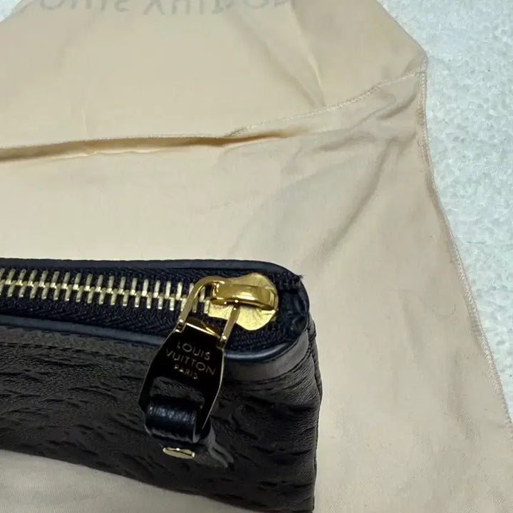 [BUNJANG] Louis Vuitton Daily Pouch Monogram Empreinte M62937 / 루이비통 데일리 파우치 모노그램 앙프렝뜨 M62937