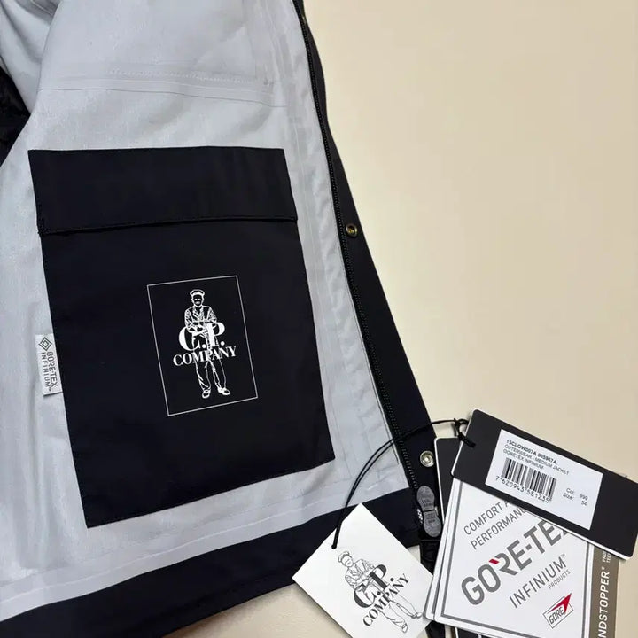 [BUNJANG] CP Company Technical Removable Fabric Down Padding Gore-Tex Jacket / CP컴퍼니 테크니컬 리무버블  패브릭 다운 패딩 고어텍스 54 사이즈
