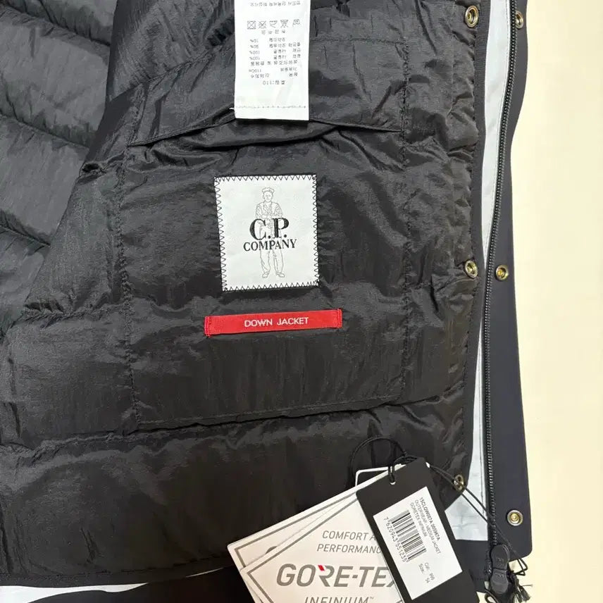[BUNJANG] CP Company Technical Removable Fabric Down Padding Gore-Tex Jacket / CP컴퍼니 테크니컬 리무버블  패브릭 다운 패딩 고어텍스 54 사이즈