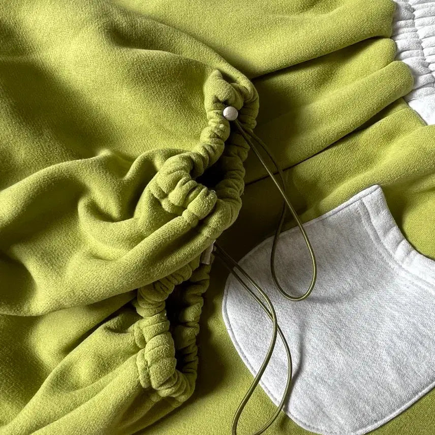 [SOLD OUT] 베이델리 양기모 투웨이 조거팬츠 라임 (미디)