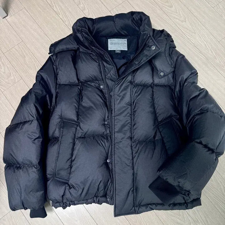 [BUNJANG] Bellelie Hooded Goose Down Puffer Jacket Cross Line Ripstop Black / 벨리에 패딩 크로스 라인 후디드 구스 다운 - 립스탑 블랙
