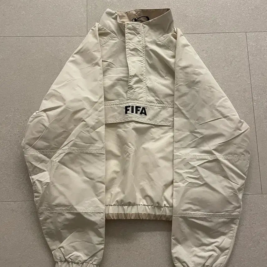 [BUNJANG] FIFA Ivory Half-Zip Windbreaker / FIFA 아이보리 바람막이 하프집업 새거