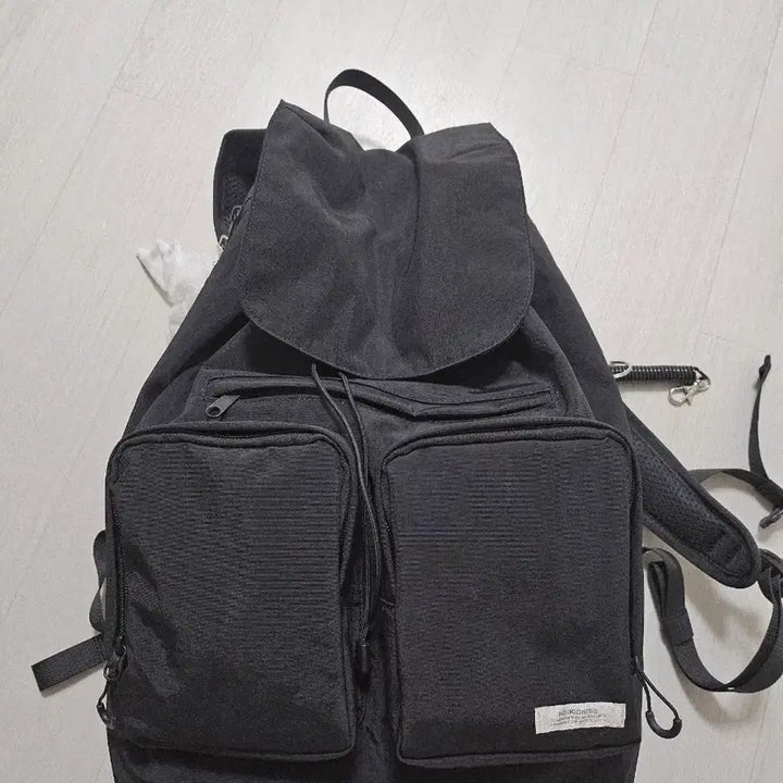[BUNJANG] Nakedis Flap String Backpack / (정가 8만) 네이키드니스 플랩 스트링 백팩