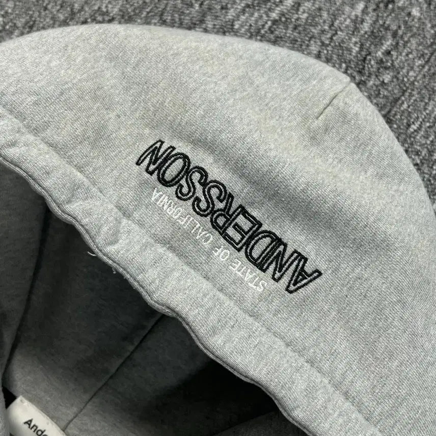 [SOLD OUT] 엔더슨벨 퍼플 레터로고 그레이 후드티
