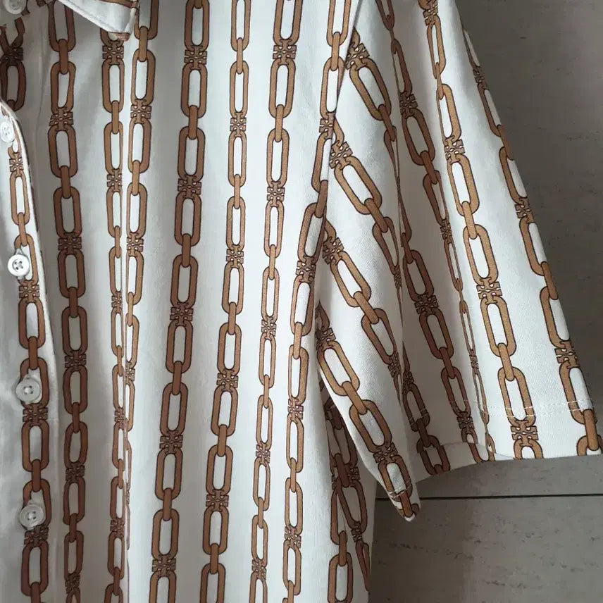 [BUNJANG] Tory Burch Chain Pattern Polo Shirt / 토리버치 체인 폴로셔츠