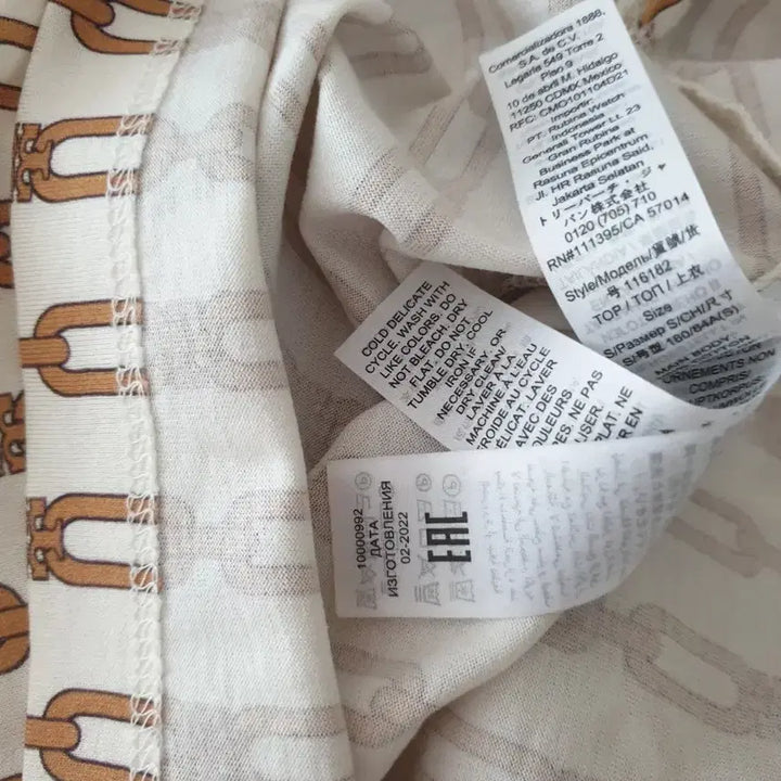 [BUNJANG] Tory Burch Chain Pattern Polo Shirt / 토리버치 체인 폴로셔츠