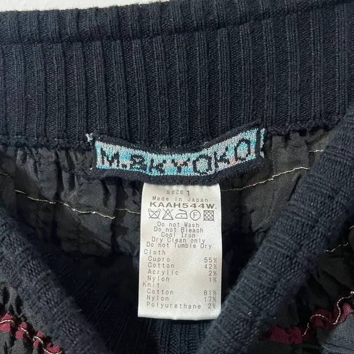 [SOLD OUT] M.KYOKO 축융 플리츠 가공 비대칭 팬츠