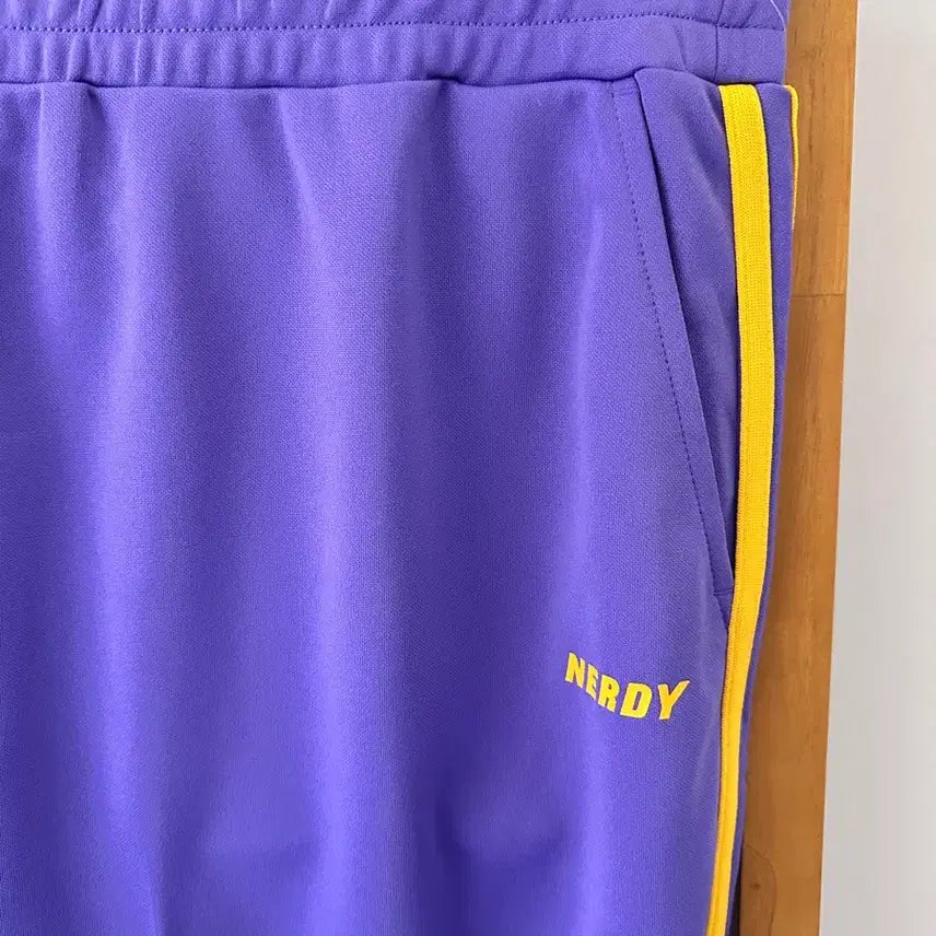 [BUNJANG] NERDY NY Track Skirt Purple/Yellow (Size M) / 널디 NY 트랙 스커트 퍼플/옐로우(사이즈 M)