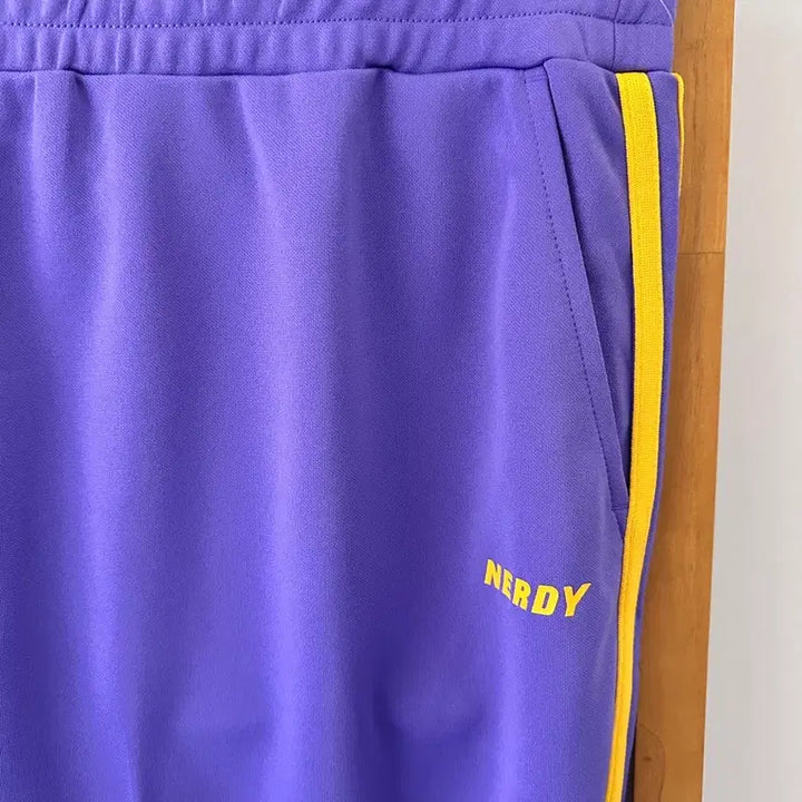 [BUNJANG] NERDY NY Track Skirt Purple/Yellow (Size M) / 널디 NY 트랙 스커트 퍼플/옐로우(사이즈 M)