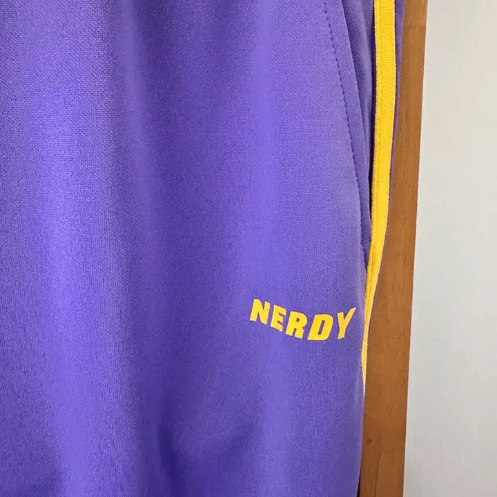 [BUNJANG] NERDY NY Track Skirt Purple/Yellow (Size M) / 널디 NY 트랙 스커트 퍼플/옐로우(사이즈 M)