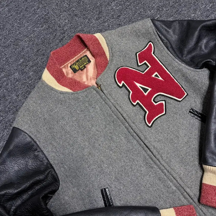 [BUNJANG] Style Eyes Sugar Cane Varsity Jacket / 스타일아이즈 슈가케인 바시티 자켓