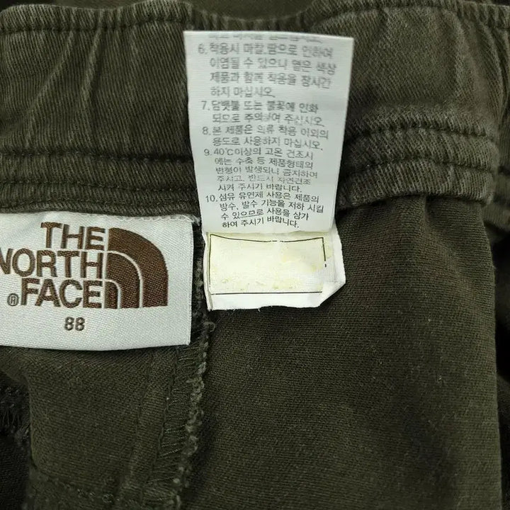 [BUNJANG] The North Face White Label Pigment Khaki Black Logo Double Knee Cargo Pants / 노스페이스 화이트라벨 피그먼트 카키 블랙 로고 밴딩 더블니 카고포켓 분토