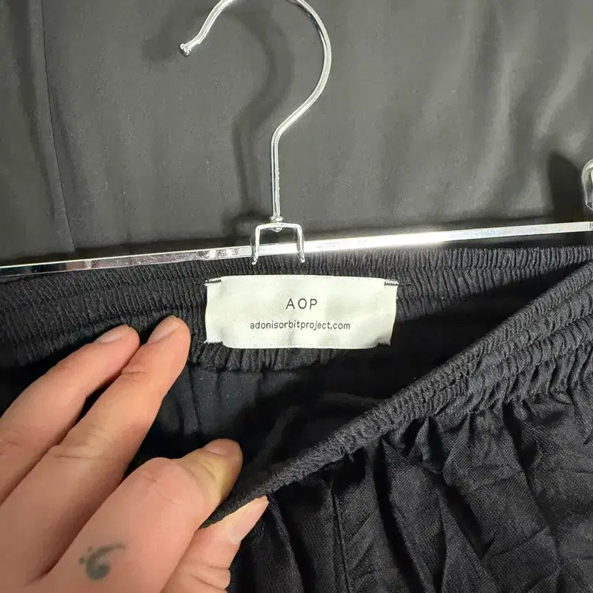 [BUNJANG] AOP 16 Snap Track Pants Off-White/Black / AOP 16스냅 트랙 팬츠 오프화이트/블랙