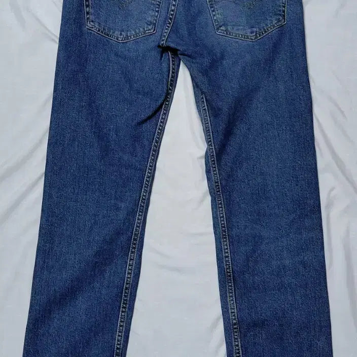 [SOLD OUT] 리바이스 502 테이퍼드핏 중청 데님 (30x32)