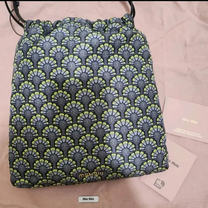 [BUNJANG] Miu Miu Patterned Drawstring Pouch Bag / 미우미우 패턴 드로스트링 파우치 가방
