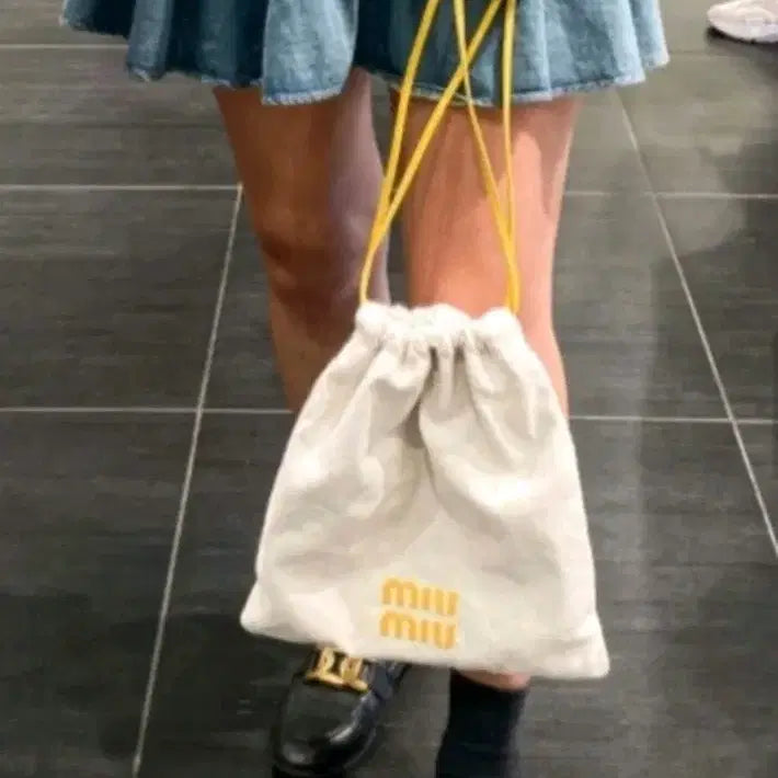[BUNJANG] Miu Miu Patterned Drawstring Pouch Bag / 미우미우 패턴 드로스트링 파우치 가방