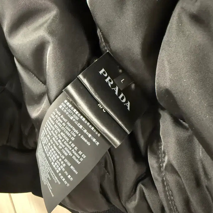 [BUNJANG] Prada Shearling Fur Padded Jacket / [L] 프라다 24fw 블랙 시어링 퍼 패딩 자켓 새상품