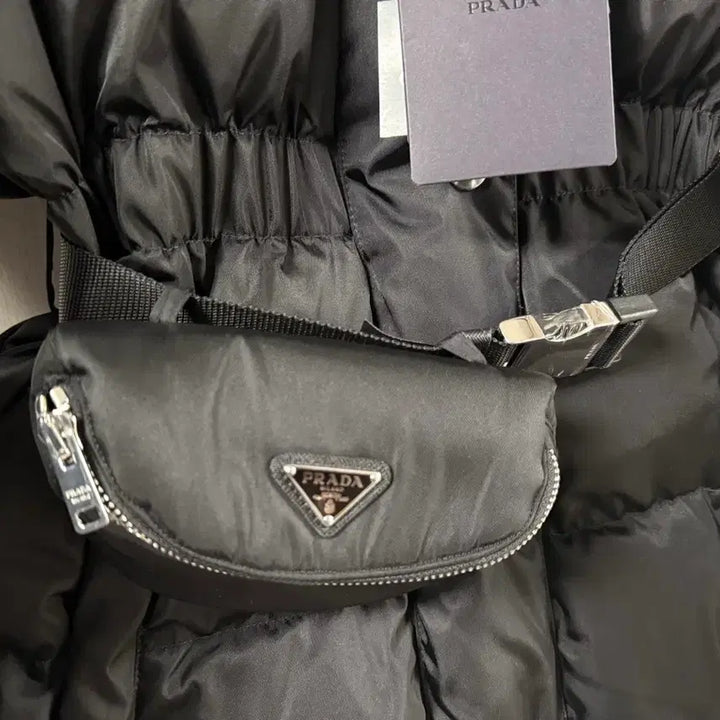 [BUNJANG] Prada Pocket Belted Padded Jacket / [40] 프라다 25fw 여성 포켓 벨트 패딩 새상품