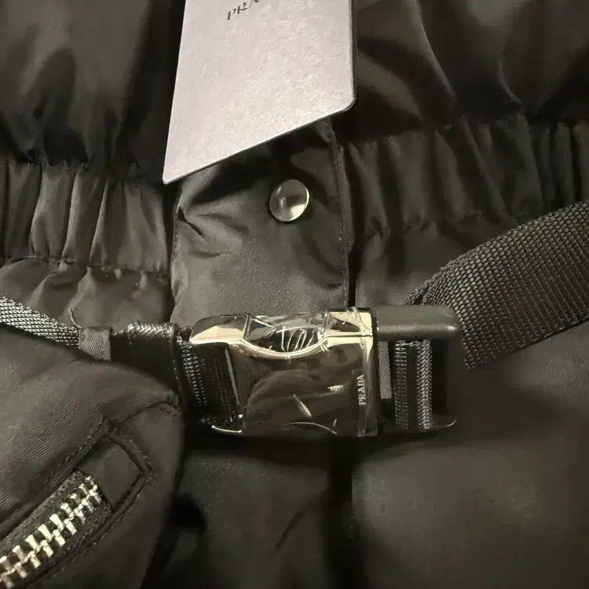 [BUNJANG] Prada Pocket Belted Padded Jacket / [40] 프라다 25fw 여성 포켓 벨트 패딩 새상품