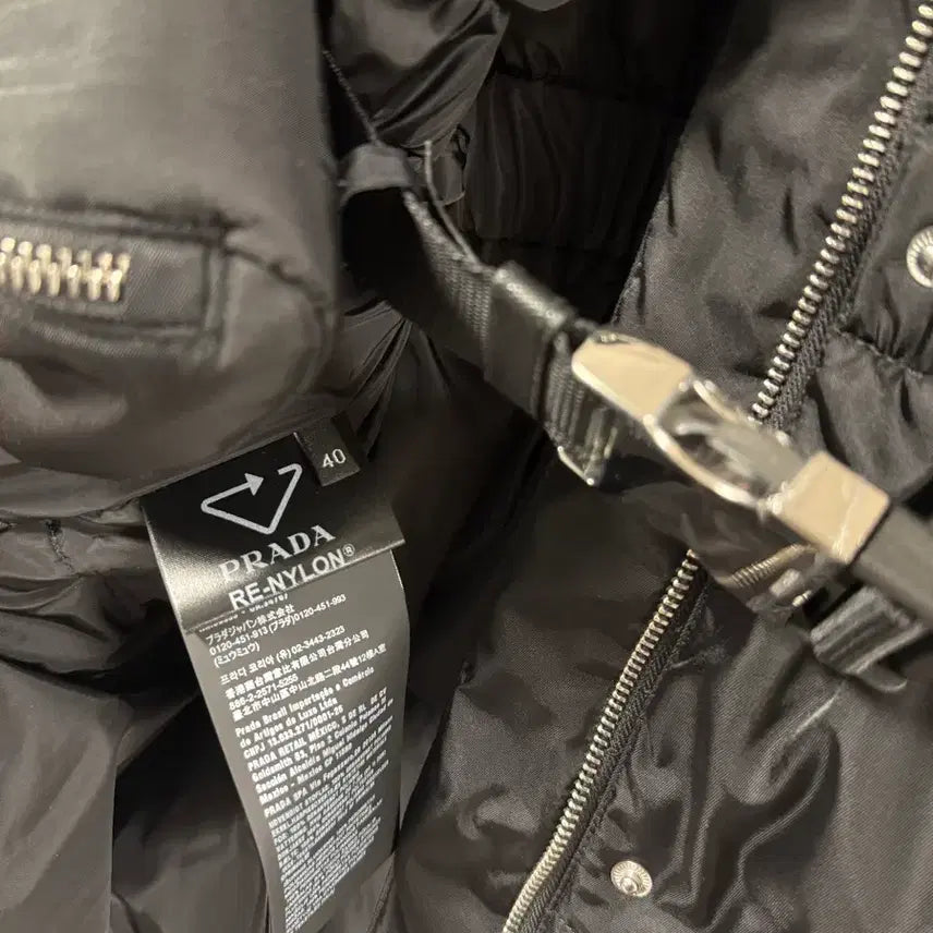 [BUNJANG] Prada Pocket Belted Padded Jacket / [40] 프라다 25fw 여성 포켓 벨트 패딩 새상품
