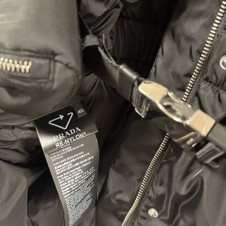 [BUNJANG] Prada Pocket Belted Padded Jacket / [40] 프라다 25fw 여성 포켓 벨트 패딩 새상품