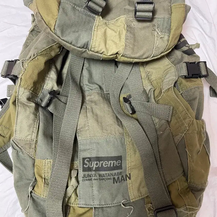 [BUNJANG] Supreme Junya Watanabe Patchwork Backpack / 슈프림 준야 와타나베 패치워크 백팩 카키
