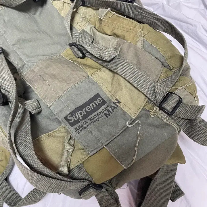 [BUNJANG] Supreme Junya Watanabe Patchwork Backpack / 슈프림 준야 와타나베 패치워크 백팩 카키