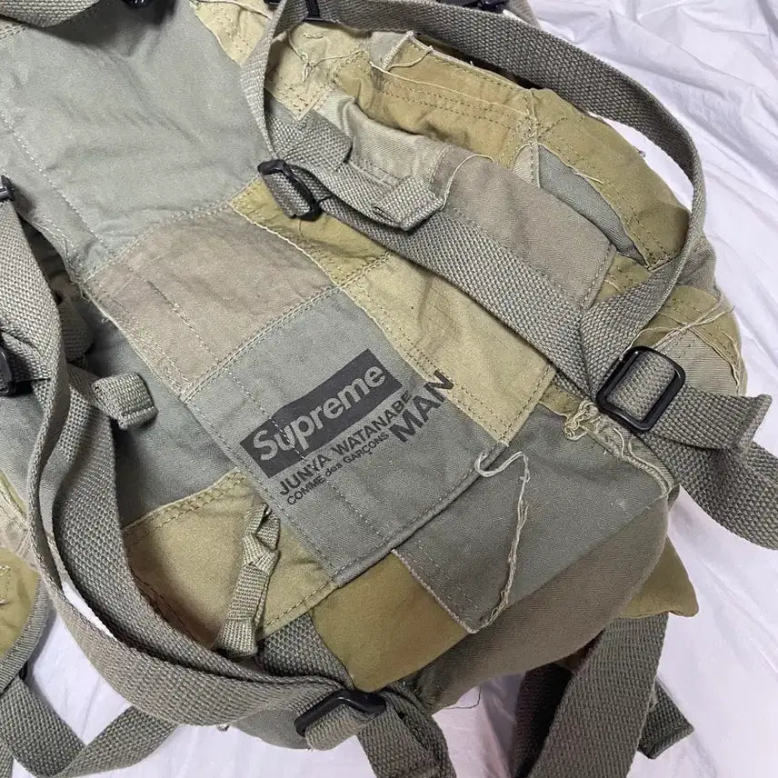 [BUNJANG] Supreme Junya Watanabe Patchwork Backpack / 슈프림 준야 와타나베 패치워크 백팩 카키