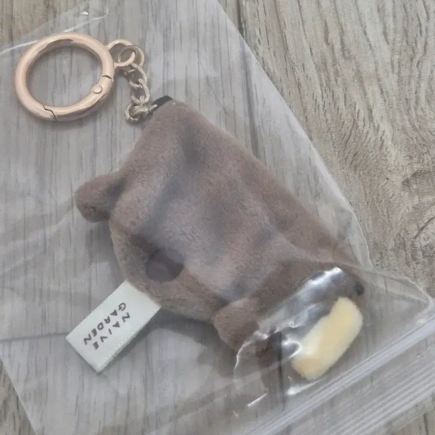 [SOLD OUT] 나이브 가든 오리너구리 이어폰 홀더 키링