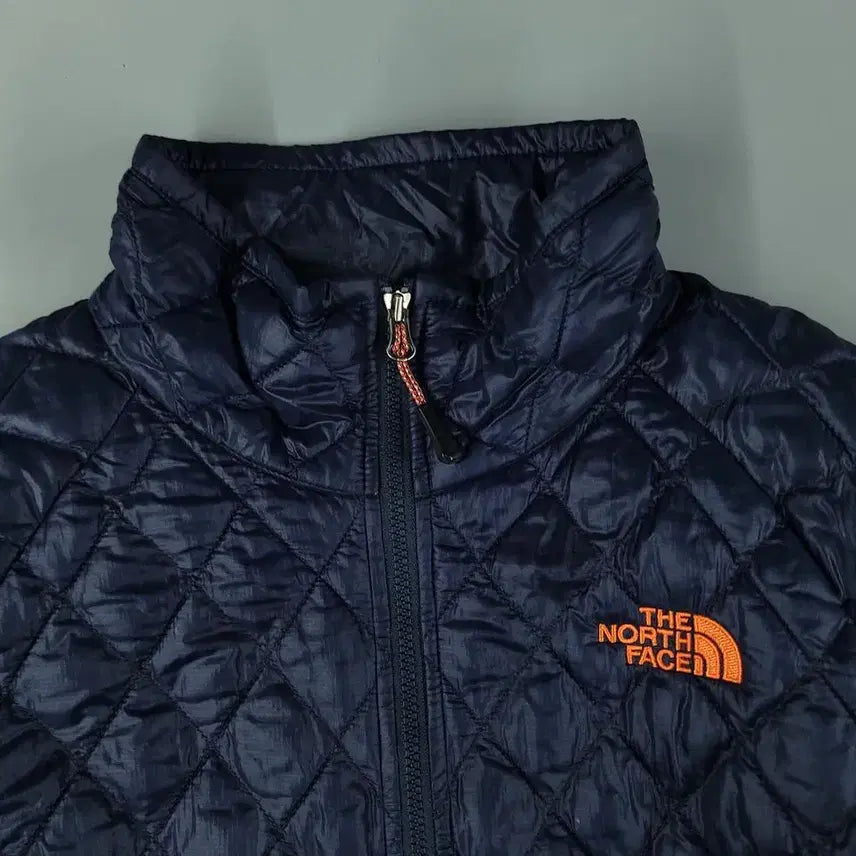 [BUNJANG] No Face Navy Orange Logo Diamond Quilting Raglan PrimaLoft Sweater / 노스페이스 반광 네이비 오렌지 로고 다이아몬드퀼팅 레글런 프리마로프트 써