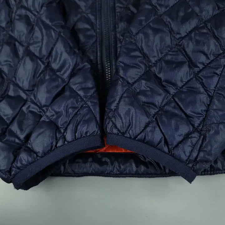 [BUNJANG] No Face Navy Orange Logo Diamond Quilting Raglan PrimaLoft Sweater / 노스페이스 반광 네이비 오렌지 로고 다이아몬드퀼팅 레글런 프리마로프트 써