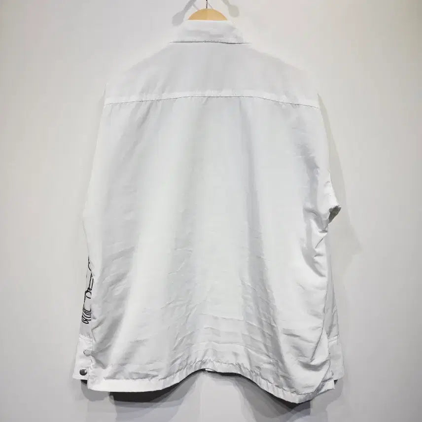 [BUNJANG] Graphiste Man.G White Embroidered Graphic Coach Jacket / Graphiste Man.G (만지) 화이트 자수 그래픽 코치 자켓
