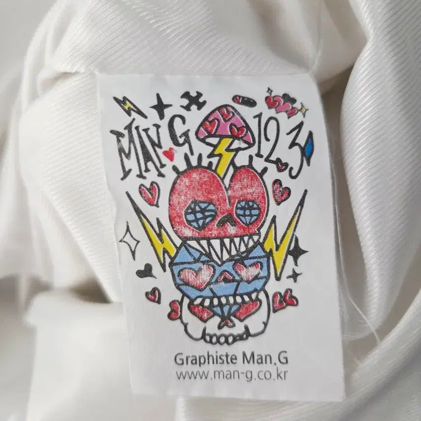[BUNJANG] Graphiste Man.G White Embroidered Graphic Coach Jacket / Graphiste Man.G (만지) 화이트 자수 그래픽 코치 자켓