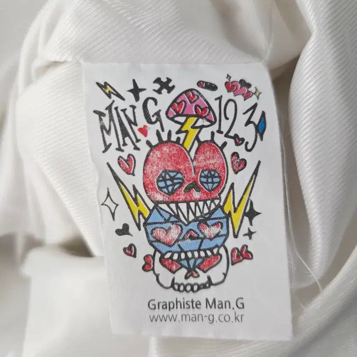 [BUNJANG] Graphiste Man.G White Embroidered Graphic Coach Jacket / Graphiste Man.G (만지) 화이트 자수 그래픽 코치 자켓