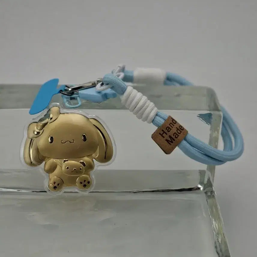 [BUNJANG] Sanrio Cinnamoroll Gold Keyring / 산리오 시나모롤 골드  키링 핸드폰 가방 금30mg함유
