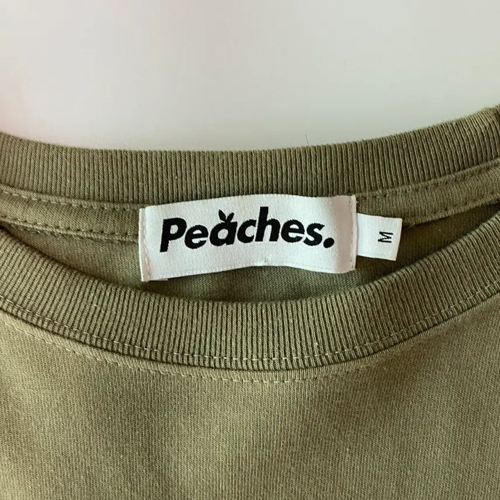 [BUNJANG] Peaches. One Universe Long Sleeve (Khaki) / [Peaches.] 피치스 원 유니버스 롱슬리브 (Khaki)