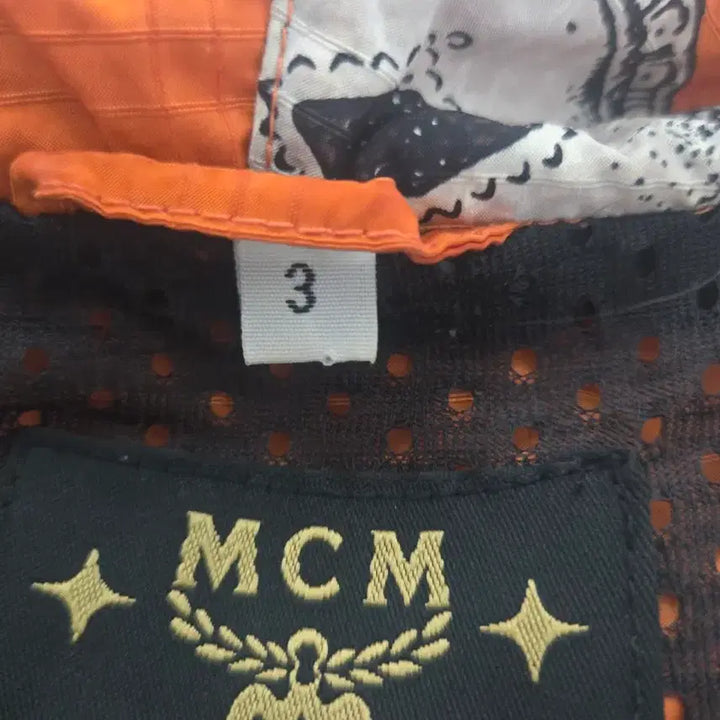 [BUNJANG] MCM Orange Pattern Hooded Vest / MCM 오렌지 패턴 후드 조끼