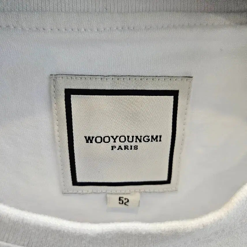 [BUNJANG] Wooyoungmi 23FW Flower Back Logo T-shirt (White) / [정품/새상품급] 23FW 우영미 플라워 백로고 반팔 티셔츠 화이트 52