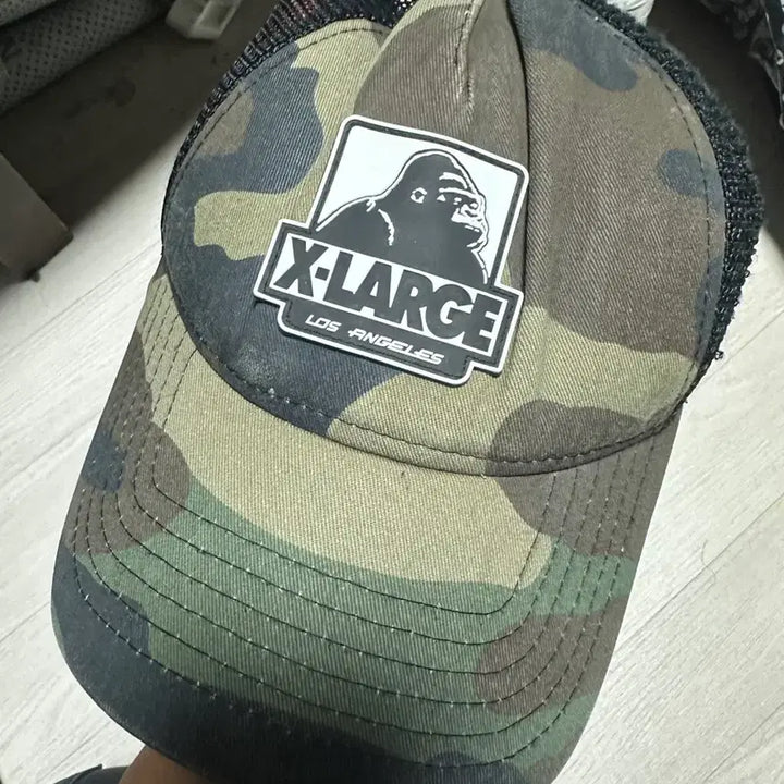 [SOLD OUT] XLARGE x New Era 워킹에이프 카모 메쉬 트러커 스냅백 캡