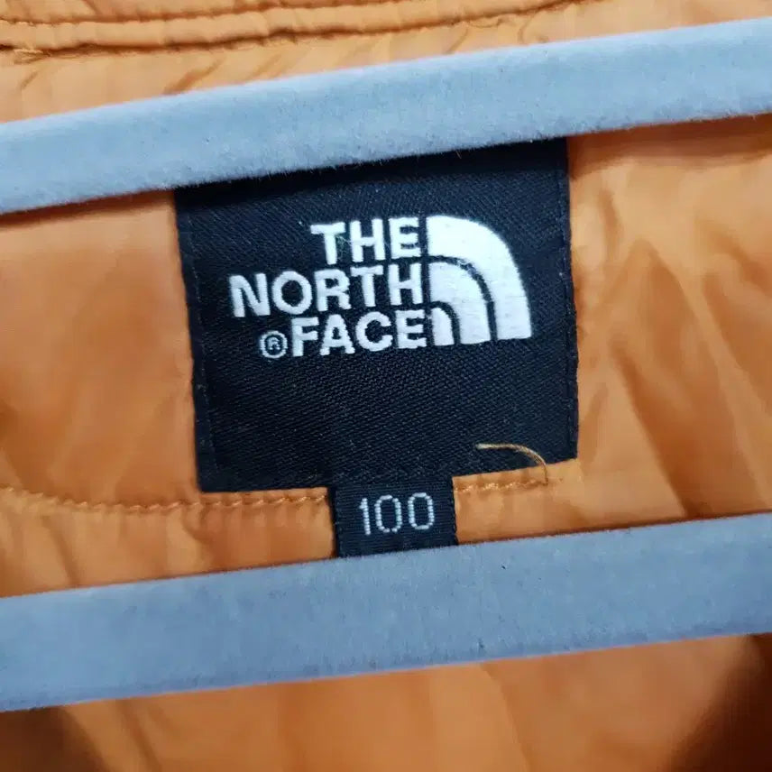 [BUNJANG] The North Face 100 Orange Lightweight Padded Vest / 노스페이스 100 오렌지 경량 패딩 조끼