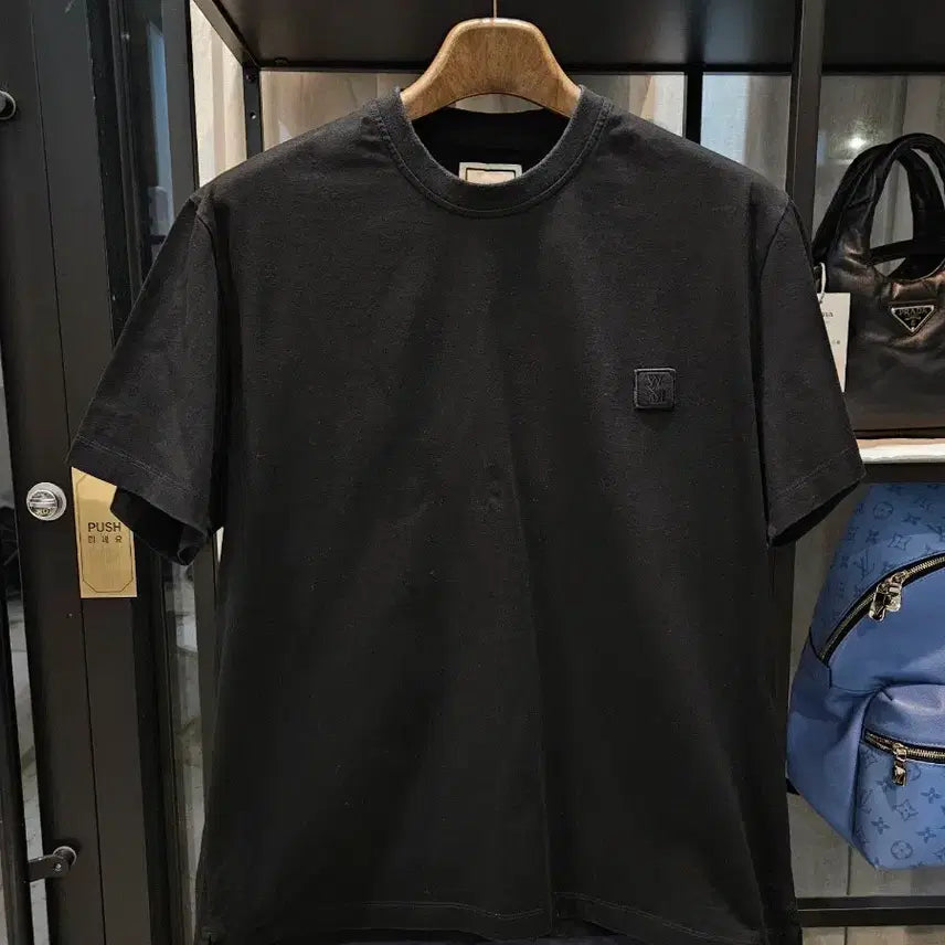 [BUNJANG] Wooyoungmi Back Logo Printed T-shirt Black / [정품/25SS/46사이즈] 우영미 백로고 프린팅 반팔티셔츠 블랙 검정