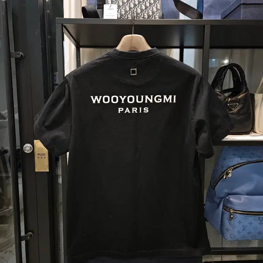[BUNJANG] Wooyoungmi Back Logo Printed T-shirt Black / [정품/25SS/46사이즈] 우영미 백로고 프린팅 반팔티셔츠 블랙 검정
