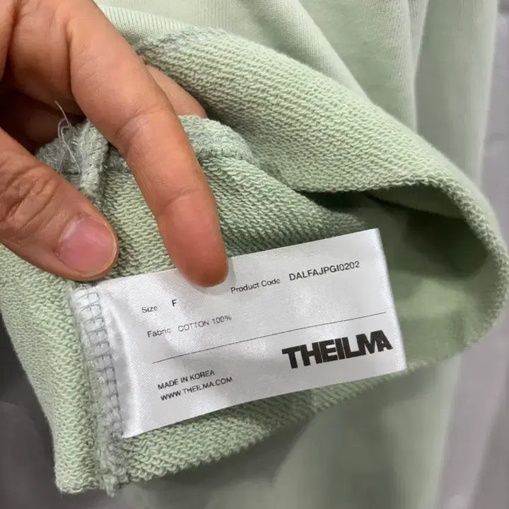 [BUNJANG] The Ilma Crop High Neck Half Zip-Up Sweatshirt / 더일마 크롭 하이넥 집업 맨투맨티